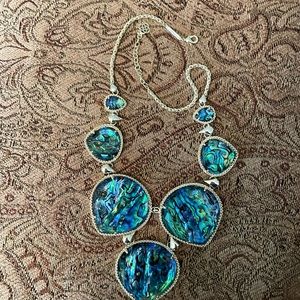 Kendra Scott “Rebecca” necklace in abalone and yellow gold